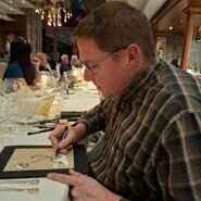 Der Weinmaler Laurent Bessot gestaltete die Urkunden  © Hubert Matt-Willmatt