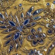 Trachtenhauben aus dem Elsaß - Detail einer Stickerei Trachtenhauben aus dem Elsaß - Detail einer Stickerei